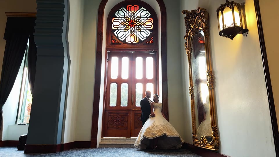 A wedding celebration inside an ornate palace
